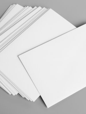 Blank portrait A4. brochure magazine isolated on gray, changeable background / white paper isolated on gray