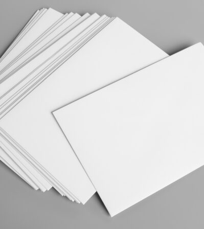 Blank portrait A4. brochure magazine isolated on gray, changeable background / white paper isolated on gray